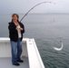 5-15 - Donnita looks happy catching bluefish.