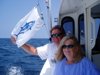 7-4 - Larry and Paula raising the tuna flag.