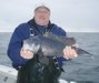 Buck with a near 4 pound sea bass.